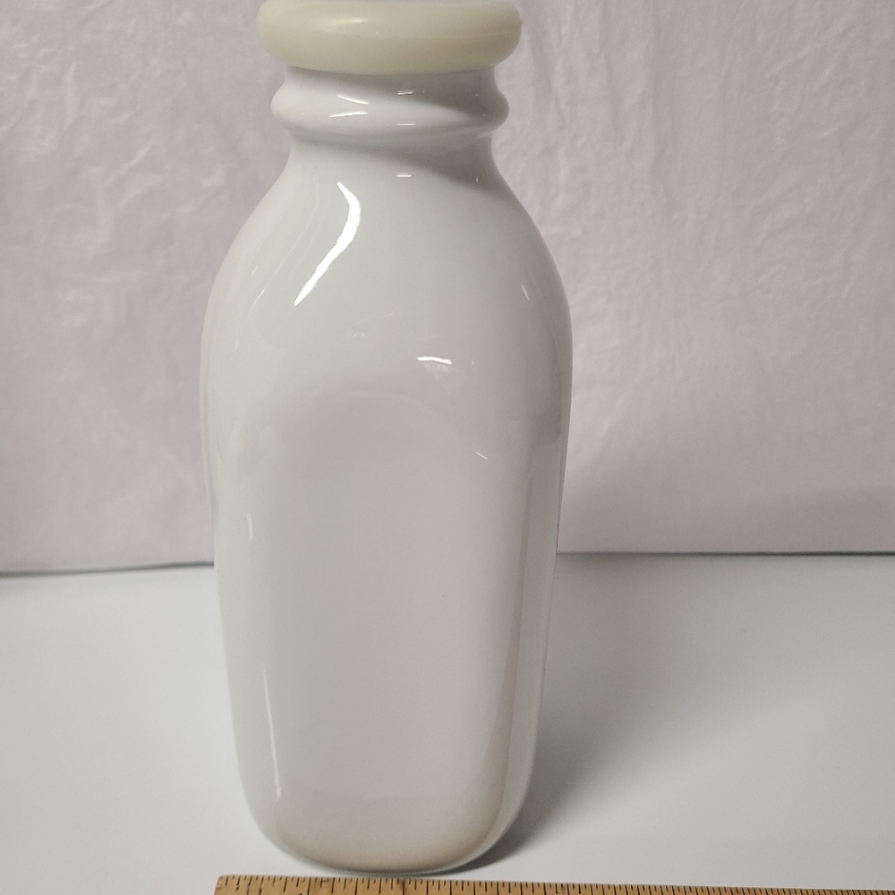 Crate & Barrel Porcelain Milk Bottle White Iconic with silicone lid.